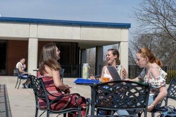 Students outside Deperno laughing - Spring Scenics_008